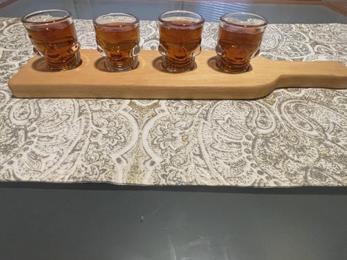 Whiskey flight with skull glasses