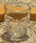 Whiskey flight with skull glasses